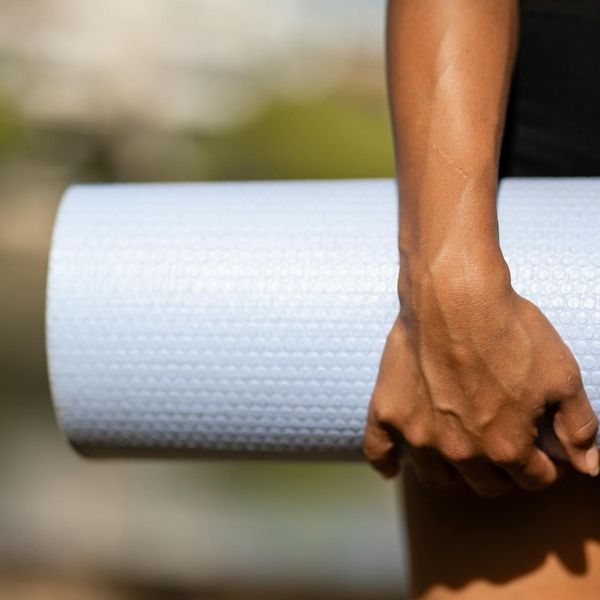 A serene outdoor scene with yoga mats ready for practice.